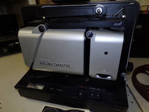 lot 11 image: Singer Instaload  XL Projector with reel