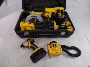 lot 7 image: Dewalt Tools with Case 18V with 3 Batteries, Charger, 2 Lights, Impact drill, Drill, Sawsall, and Skill saw