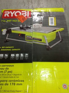 lot P7 image: RYOBI 7 in. 4.8 Amp Tabletop Tile Saw in good conditions