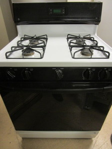 lot 414 image: GE XL44 GAS STOVE