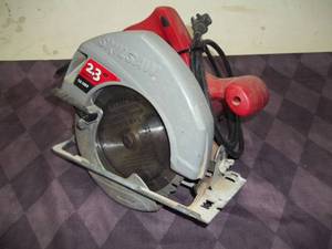 lot 26 image: 7 14 Circular Saw