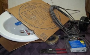 lot 260 image: Sink Basin and Assorted Plumbing Supplies