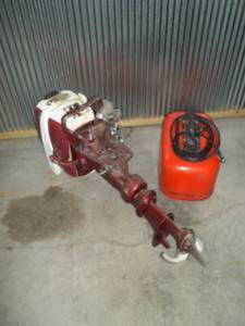lot 299 image: Boat Motor with Fuel Can