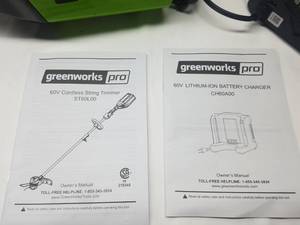 lot 12 image: Greenworks Pro 60-volt Max 16-in Straight Cordless String Trimmer (Battery Not Included) charger is included