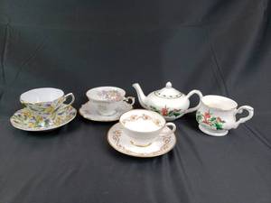 lot 39 image: 3 Sets of Teacups and Saucers & A Cup of Christmas Tea