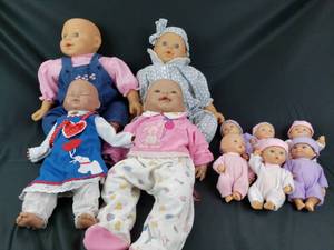 lot 42 image: Baby Dolls, Lifelike 4 Large and 6 Small
