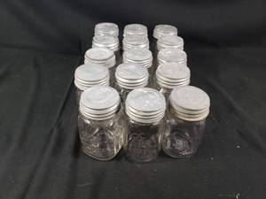 lot 86 image: 12 Ball and 3 Kerr Jars With Zinc Lids