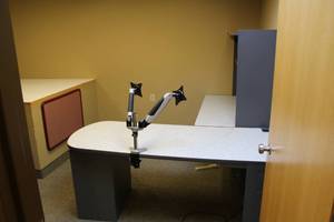 lot 36 image: L-Shaped 2-Piece Office Desk, Desk-Mount Dual Computer Monitor Mount, Rolling Office Arm Chair, 2-Office Chairs, 3-Drawer Metal Lateral File Cabinet, Round Office Table