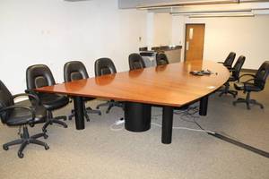 lot 54 image: Quarter Round Wood Conference Table, 9-Black Leather Rolling Office Arm Chairs