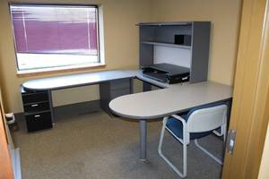 lot 56 image: U-Shaped Office Desk, Desk top Bookcase, File Cabinet, Whiteboard, Office Chair, Ergotron Monitor-Riser