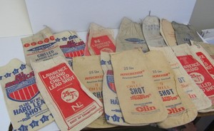 lot 57 image: Large Lot of Vintage Canvas ShotAmmoBB Advertising Pouches