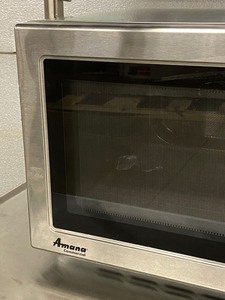lot 20 image: Amana Microwave Oven
