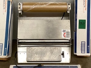 lot 21 image: Heat-Seal Countertop Wrapping Station