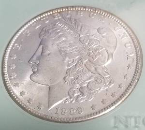 lot 03 image: 1889 MORGAN SILVER DOLLAR MS65 NTC