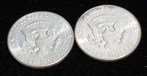 lot 15 image: 2 BU-UNC 1964 KENNEDY SILVER HALF DOLLARS