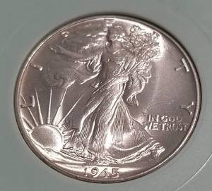 lot 31 image: 1945 WALKING LIBERTY HALF DOLLAR MS65 NTC
