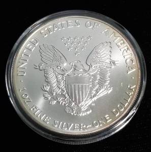 lot 43 image: 1991 AMERICAN SILVER EAGLE 1 TROY OZ. .999 FINE SILVER IN AIRTITE