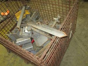 Steel cage crate full of assorted m...