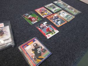 lot 231 image: 25 Football Rookie Cards...