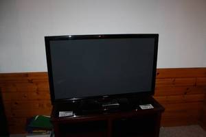 lot 187 image: Insignia 49in. Flat Screen TV with Remote Control