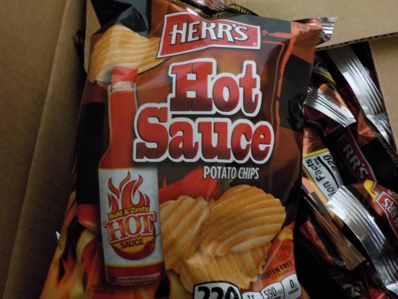 lot 89 image: 1 Case Heirs Hot Sauce Pototo Chip...