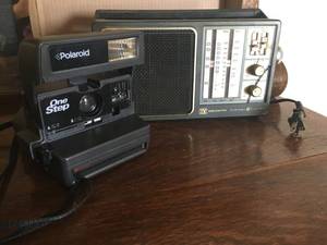 Vintage Weather-band Radio and Polaroid Camera