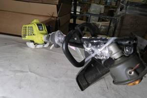 lot T59 image: 4-Cycle 30cc Attachment Capable Straight Shaft Gas Trimmer