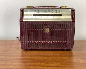 lot 100 image: Antique Motorola AM Radio