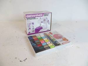 lot 38 image: Mini Sewing Machine & Accessories