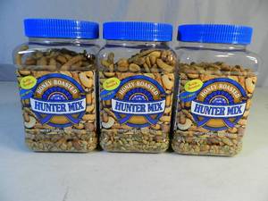 lot 34 image: 3 New Canisters of Honey Roasted Hunters Mix