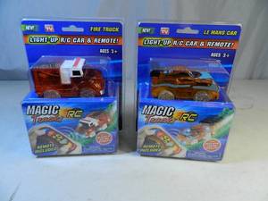 lot 49 image: 2 New Light Up RC Cars with Remotes
