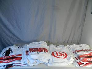 lot 79 image: 36 New Dakota Style Tshirts