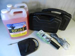 lot 94 image: Deer Attractant, New Pistol Cases, Tools, Etc