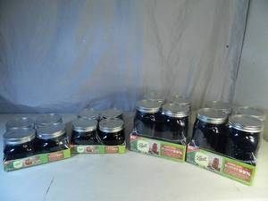lot 100 image: 16 New Ball Amber Clock Jars with Lids