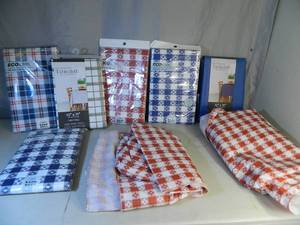 lot 128 image: 8 New Assorted Tablecloths