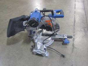 lot 56 image: Kobalt 10-in 15-Amp Dual Bevel Bevel Sliding Compound Miter Saw SM2517LW