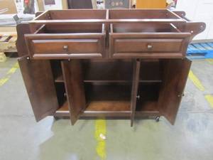 lot 38 image: Crosley Furniture Rolling Kitchen Island - Cabinet Only - Vintage Mahogany CF3001-MA