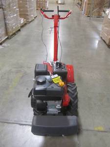 lot 17 image: Troy-bilt Mustang 18 in. 208 cc Gas OHV Engine Rear-Tine Tiller with Forward-Rotating and Counter-Rotating Tilling Options