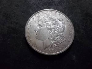 lot 22 image: 1885 O Morgan Silver Dollar
