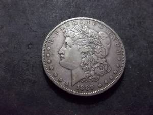 lot 27 image: 1889 O Morgan Silver Dollar