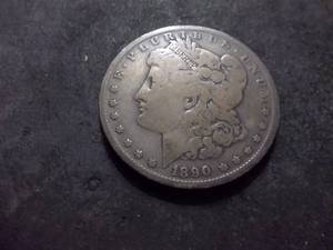 lot 28 image: 1890 O Morgan Silver Dollar