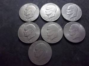 lot 78 image: 7-Ike Dollars 1972-1977