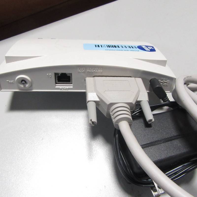 lot 11 image: Lot of 2 HP JETDIRECT 170X wpower adapters and cables