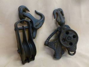 lot 244 image: Antique Pullys