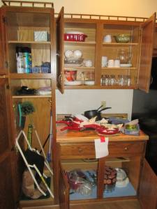 Entire contents of cabinets,  Pots,...