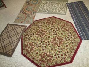 7 various size runner rugs...