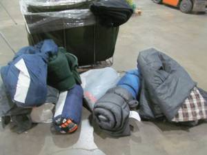 lot 58 image: sleeping bags, air mattress, laundry cart