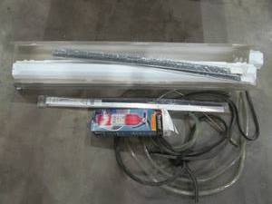 lot 81 image: fire extinguishers, door sweeps, hose, lights