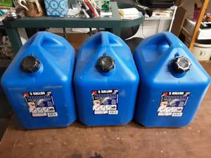 lot 11 image: NEW 3-5 Gallon Kerosene Cans