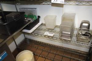 lot 34 image: Measuring Containers, Food Storage Containers, Lids, Cookie Cooling Racks, And More